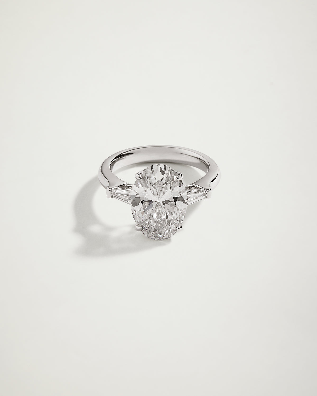 Oval Diamond Engagement Ring with Tapered Baguettes, WG