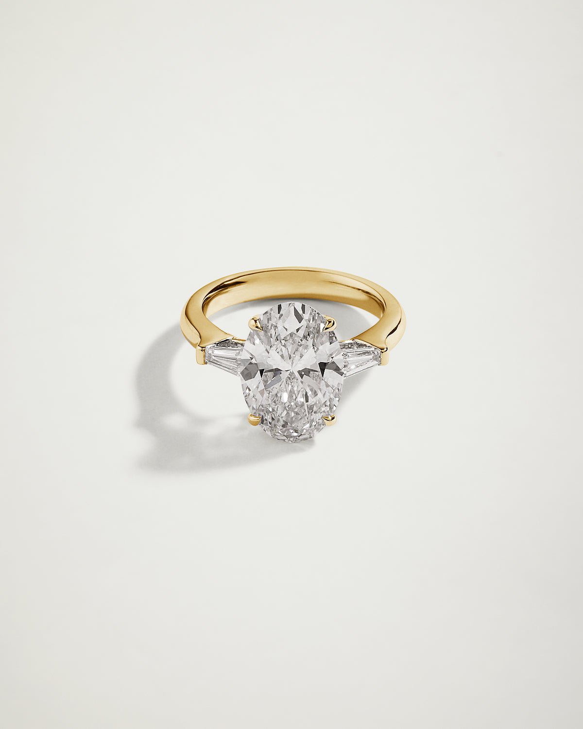 Oval Diamond Engagement Ring with Tapered Baguettes, YG