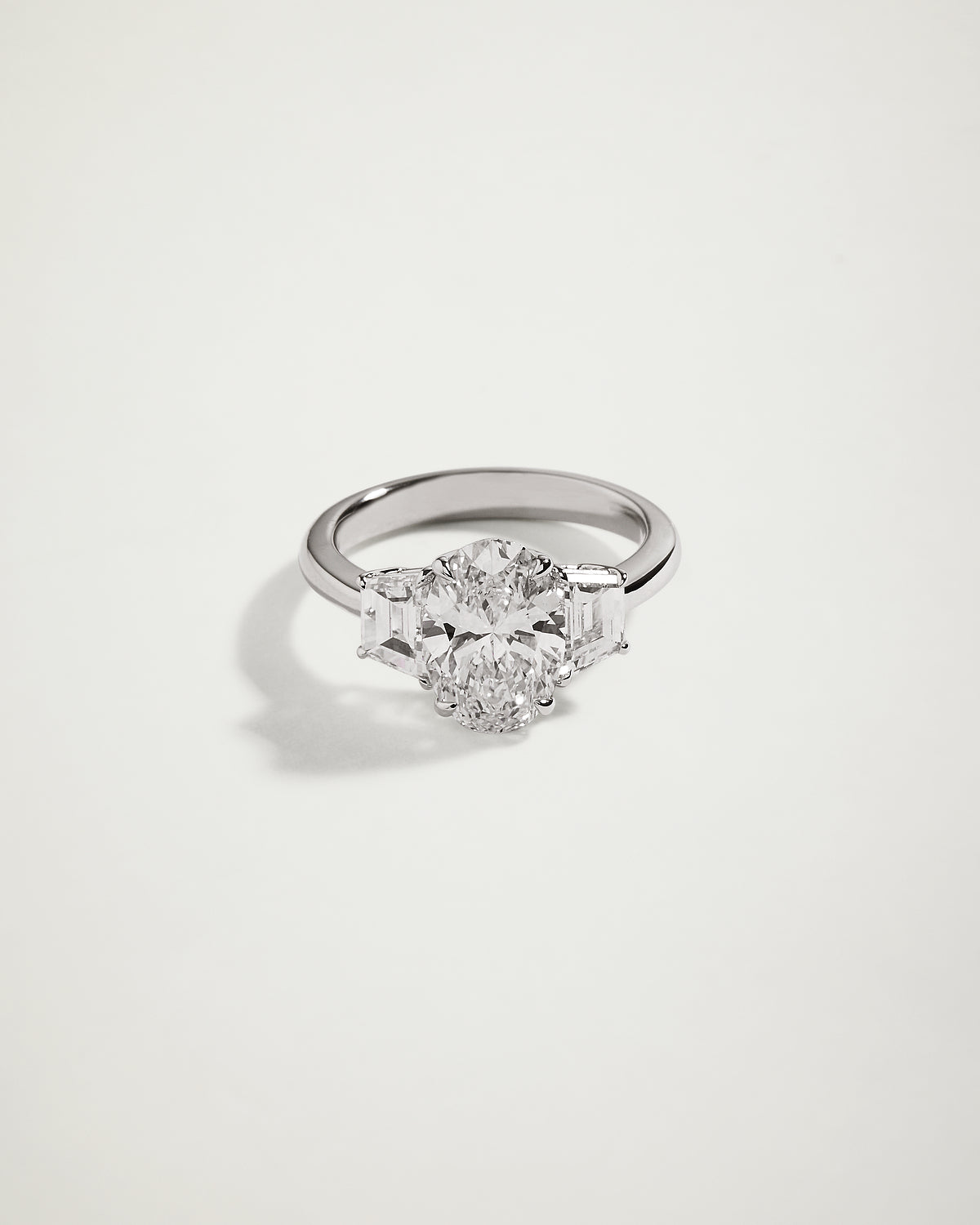 Trilogy Oval Diamond Engagement Ring with Trapezoids, WG