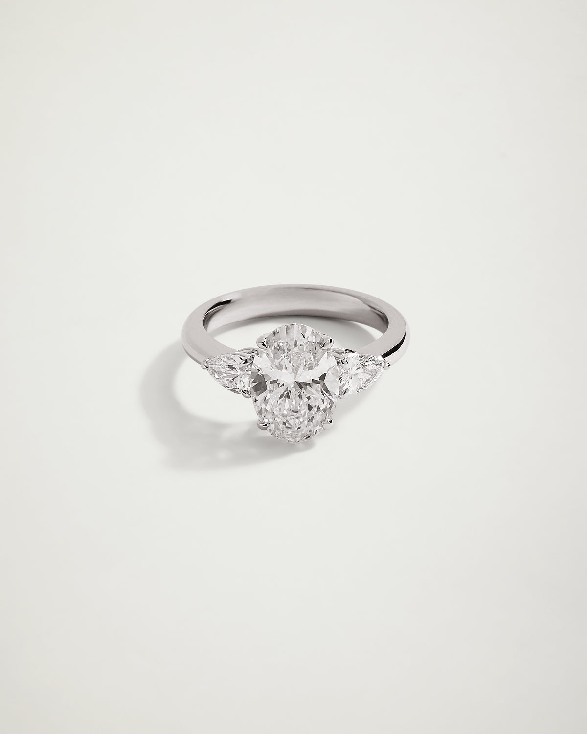 Trilogy Oval Diamond Engagement Ring with Pears, WG