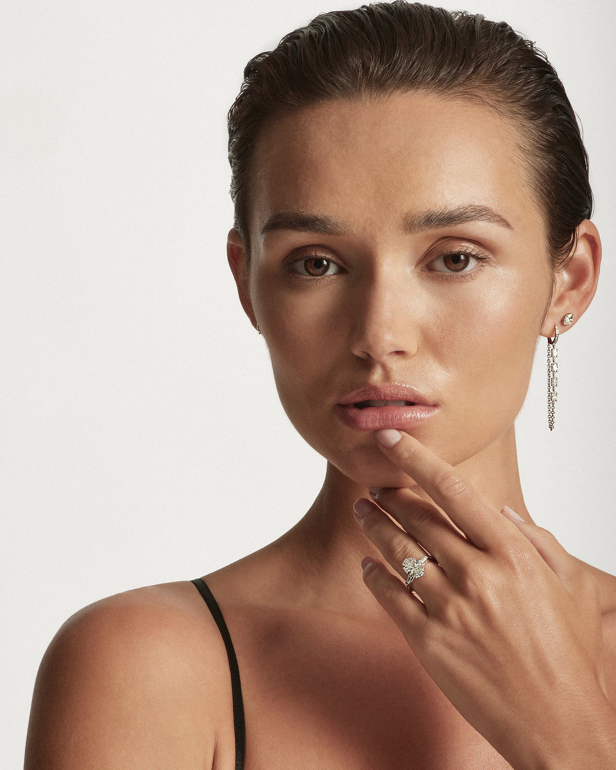 Oval Diamond Engagement Ring with Tapered Baguettes, WG